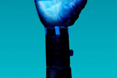 Gucci Innovation - Prosthetic Arm on Blue Background