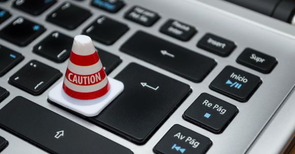 Data Protection - White Caution Cone on Keyboard