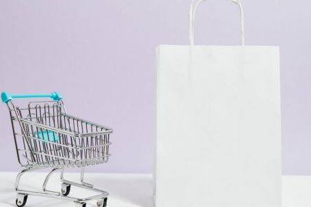 Beauty Shopping Guide - Push Cart and a White Paperbag