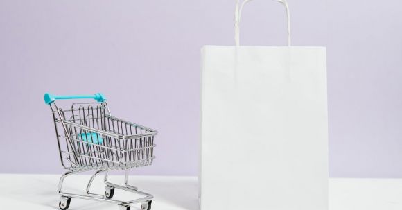 Beauty Shopping Guide - Push Cart and a White Paperbag